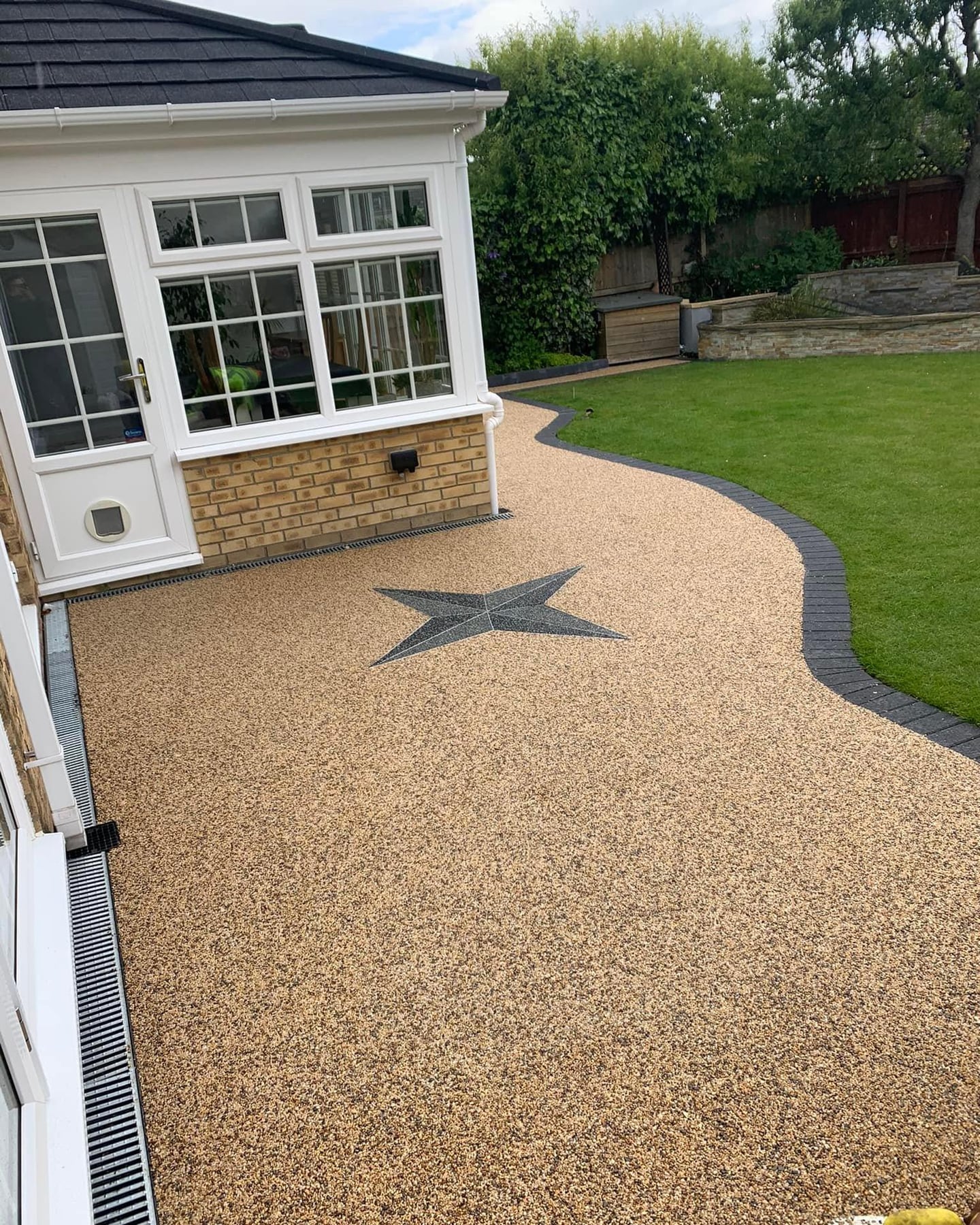 Pale resin courtyard with decorative star detail